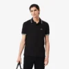 Polo L.12.12 da uomo, vestibilità regolare con dettagli decorativi Polo L.12.12 da uomo, vestibilità regolare con dettagli decorativi