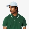 Polo L.12.12 da uomo, vestibilità regolare con dettagli decorativi Polo L.12.12 da uomo, vestibilità regolare con dettagli decorativi