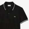 Polo L.12.12 da uomo, vestibilità regolare con dettagli decorativi Polo L.12.12 da uomo, vestibilità regolare con dettagli decorativi