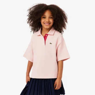 Polo oversize in piqué da bambina