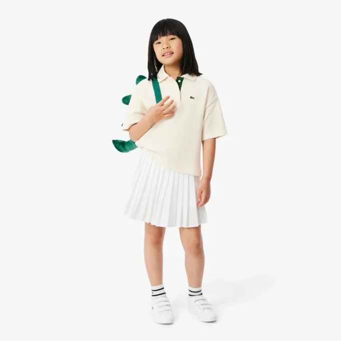 Polo oversize in piqué da bambina