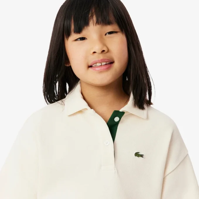 Polo oversize in piqué da bambina