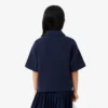 Polo oversize in piqué da bambina Polo oversize in piqué da bambina