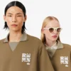Polo oversize in raso con badge Runway