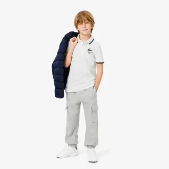 Polo Petit Piqua con colletto a righe da bambino