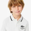 Polo Petit Piqua con colletto a righe da bambino Polo Petit Piqua con colletto a righe da bambino