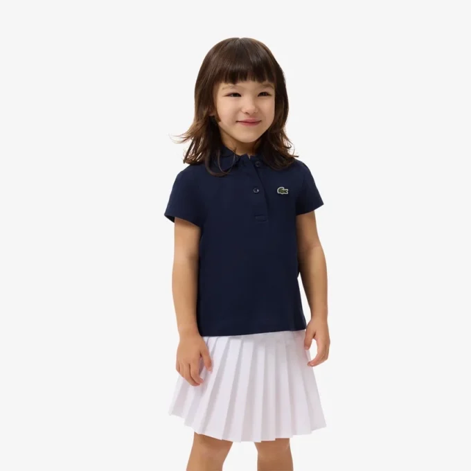Polo Piqua con collo smerlato da bambina Polo Piqua con collo smerlato da bambina