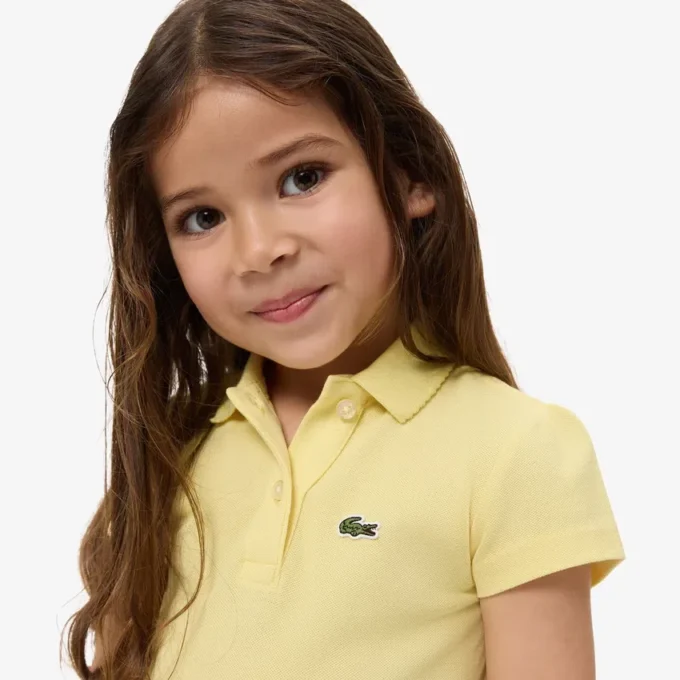 Polo Piqua con collo smerlato da bambina