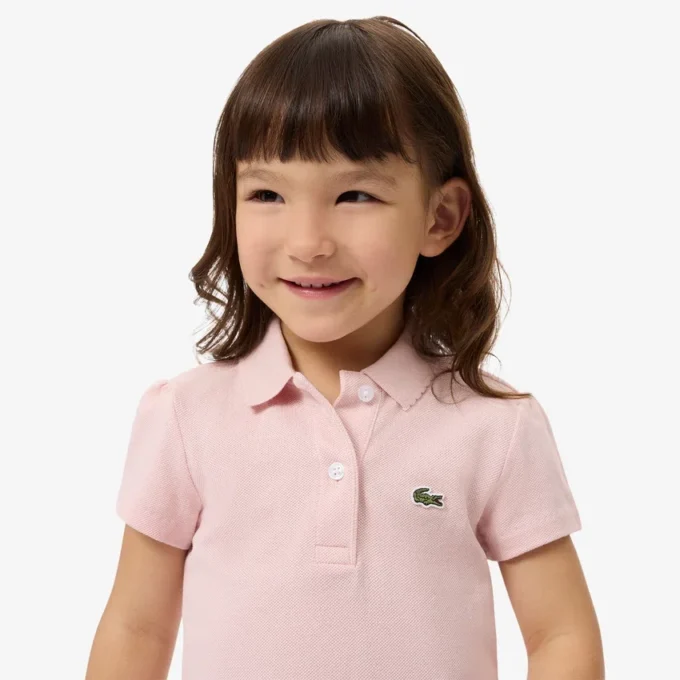 Polo Piqua con collo smerlato da bambina