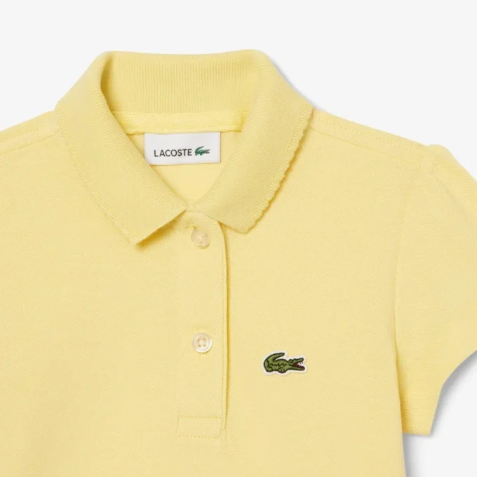 Polo Piqua con collo smerlato da bambina