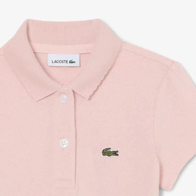 Polo Piqua con collo smerlato da bambina
