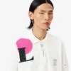 Polo Runway in piqué con stampa grafica, vestibilità ampia