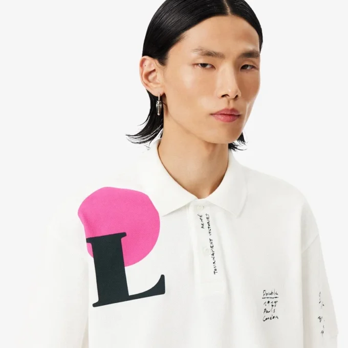 Polo Runway in piqué con stampa grafica, vestibilità ampia