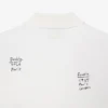Polo Runway in piqué con stampa grafica, vestibilità ampia