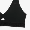 Reggiseno in microfibra con fascia traforata Reggiseno in microfibra con fascia traforata