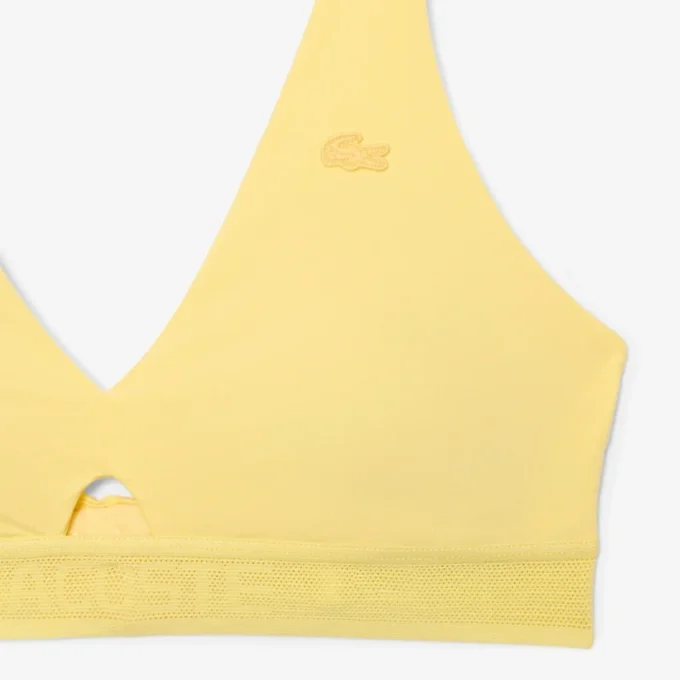 Reggiseno in microfibra con fascia traforata Reggiseno in microfibra con fascia traforata