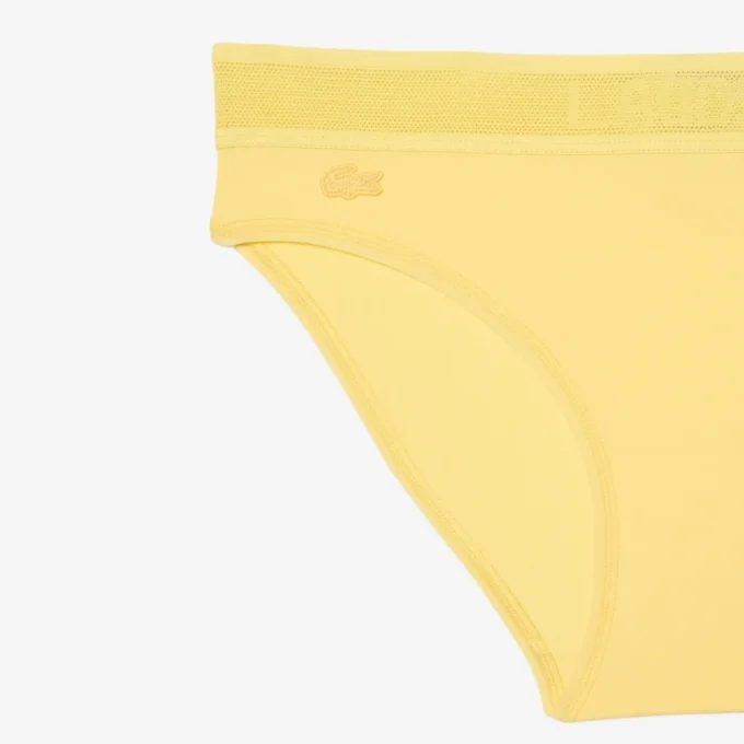 Slip in rete con logo in vita Slip in rete con logo in vita