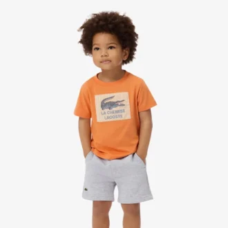 T-shirt in cotone con badge