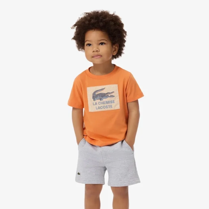 T-shirt in cotone con badge T-shirt in cotone con badge