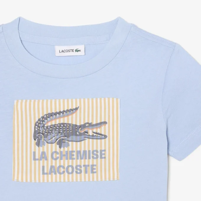 T-shirt in cotone con badge T-shirt in cotone con badge