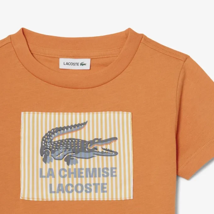 T-shirt in cotone con badge T-shirt in cotone con badge