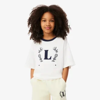 T-shirt in cotone con badge a contrasto
