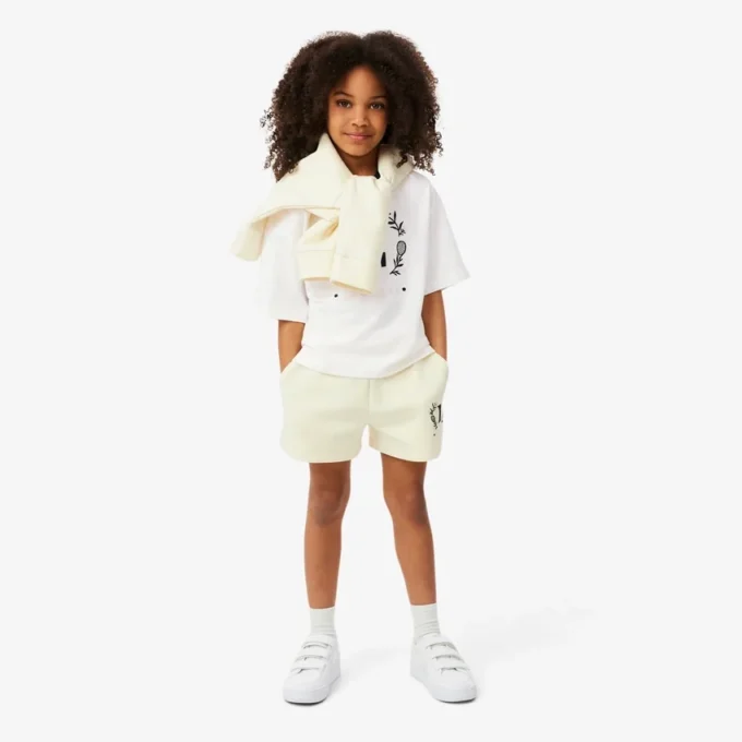 T-shirt in cotone con badge a contrasto T-shirt in cotone con badge a contrasto