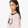 T-shirt in cotone con badge a contrasto T-shirt in cotone con badge a contrasto