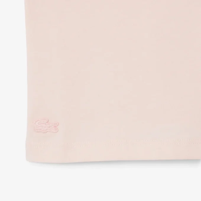 T-shirt in cotone con badge a contrasto T-shirt in cotone con badge a contrasto