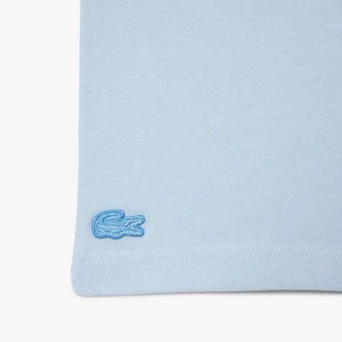 T-shirt in cotone con dettaglio badge T-shirt in cotone con dettaglio badge