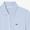 Tuta con colletto polo in piqué elasticizzato Tuta con colletto polo in piqué elasticizzato