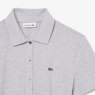 Tuta con colletto polo in piqué elasticizzato