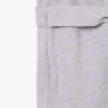 Tuta con colletto polo in piqué elasticizzato Tuta con colletto polo in piqué elasticizzato